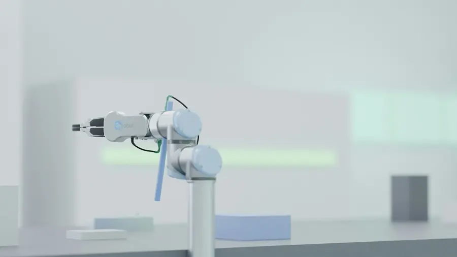 Clean, minimal assembly station with robotic tooling